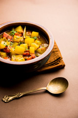 Lauki/doodhi ki Sabji also known as bottle gourd curry. served in a bowl or karahi. selective focus