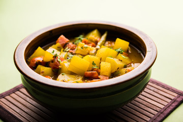 Lauki/doodhi ki Sabji also known as bottle gourd curry. served in a bowl or karahi. selective focus