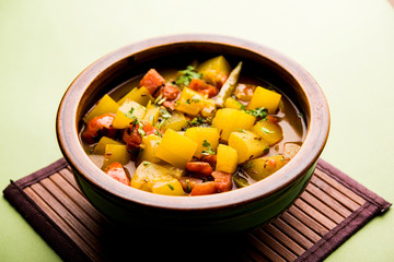 Lauki/doodhi ki Sabji also known as bottle gourd curry. served in a bowl or karahi. selective focus