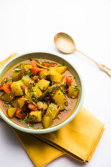 Lauki/doodhi ki Sabji also known as bottle gourd curry. served in a bowl or karahi. selective focus