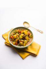 Lauki/doodhi ki Sabji also known as bottle gourd curry. served in a bowl or karahi. selective focus