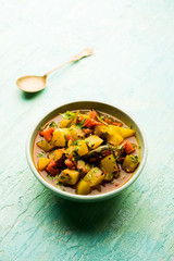 Lauki/doodhi ki Sabji also known as bottle gourd curry. served in a bowl or karahi. selective focus