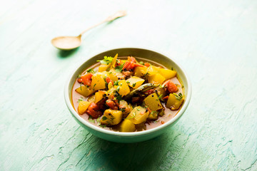 Lauki/doodhi ki Sabji also known as bottle gourd curry. served in a bowl or karahi. selective focus