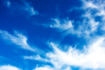 Fantastic soft white clouds against blue sky background.