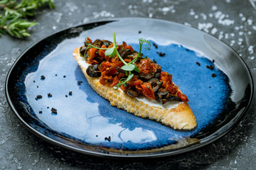 Bruschetta with dried tomatoes and olives