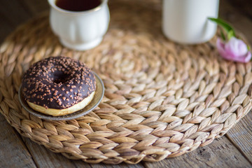 Donuts with fragrant tea. Bakery products. Peonies