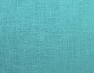 Textured background of blue natural textile   
