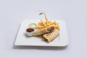A low contrast Hero shot of a beef wrap sandwich with samurai & alger sauce and fries on the side, on a minimal white background with a 45 degree angle from front zoomed in perspective
