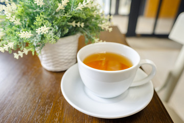 Cup of Hot Tea and Vase