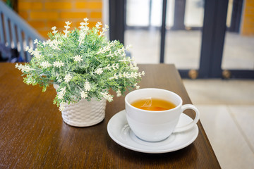 Cup of Hot Tea and Vase