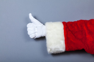 Weihnachtsmann Hand mit Daumen hoch