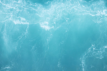 Sea  Waves in ocean wave Splashing Ripple Water. Blue water background. Leave space for writing messages.