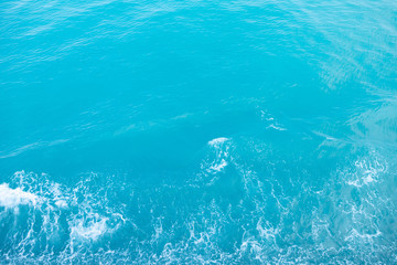 Sea  Waves in ocean wave Splashing Ripple Water. Blue water background. Leave space for writing text. 