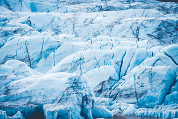 A closeup shot of a blue glacier