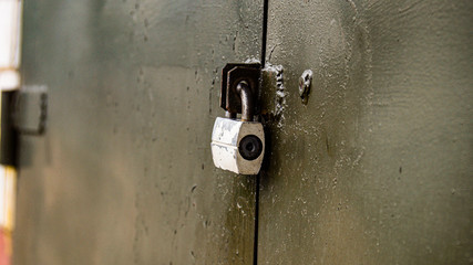 old padlock on the gate