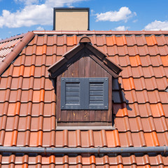 Dutch Red Roof with Dormer and Closed Windows