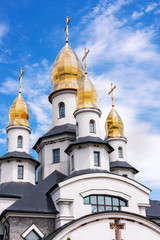 Fototapeta na wymiar Buki or Buky, Kyiv Region, UKRAINE - June 30, 2019: Facade of a Modern Christian Church in the Buki Summer Park