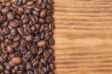 A cup of coffee and scattered coffee beans. Layout. Flat lay. Coffee bean.