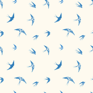 Seamless pattern with black flying swallow birds