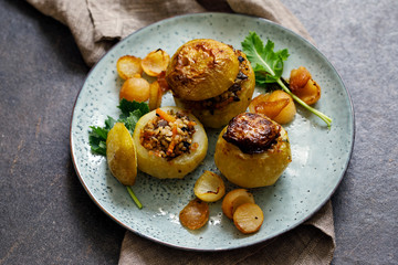 Roast kohlrabi stuffed with bulgur wheat and mushrooms