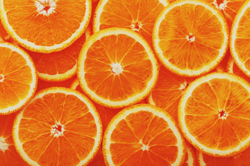 Round pieces of orange in the form of texture
