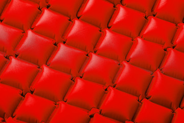 The texture of the cranes inflatable travel mat, repeating sections and patterns