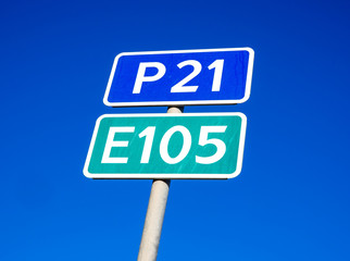 The plate with the number of the route P21 (E105) 