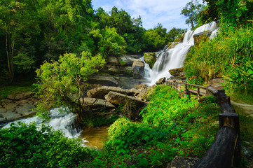 Beautiful waterfall in green forest shoot by slow shutter speed to make the water look softer,Mae...