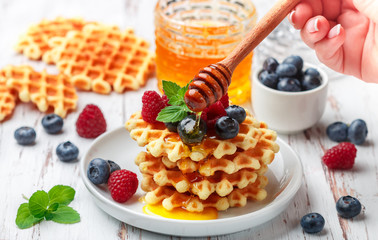 healthy breakfast with waffles and fresh berries