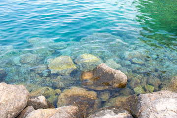 Adriatic sea water and stones on the shore, Porat, Krk island, Croatia