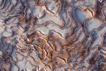 Turkey, details of the travertine terraces at Pamukkale (Cotton Castle), natural site of sedimentary rock deposited by water from the hot springs, famous for a carbonate mineral left by flowing water