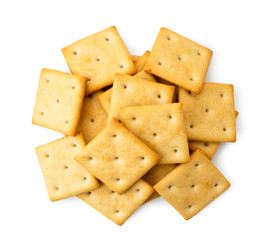Pile of crackers on a white background. The view of the top.