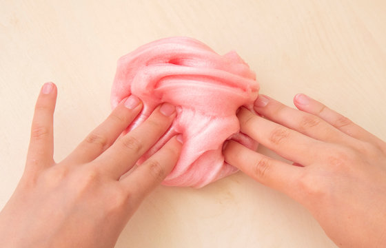 Child playing with slime
