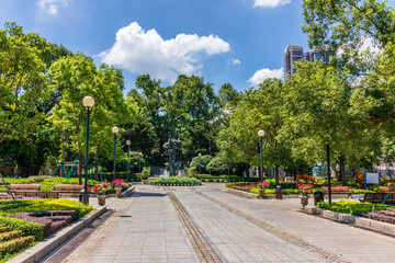 Fototapeta na wymiar Panorama of Park Garden, Jardim Luis de Camoes with central monument. Santo António, Macao, China. Asia.