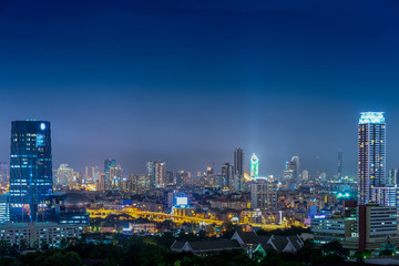 Fototapeta na wymiar High-rise buildings in Bangkok open fire at night.