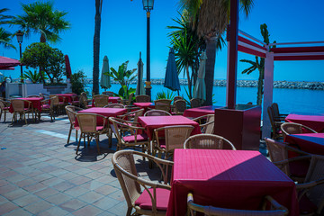 Resort, Sun terraces for tourists in summer in Marbella, Malaga, Spain