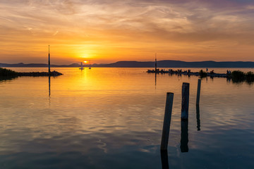 Fototapeta na wymiar Sunset over Lake Balaton from the harbor of Balatonlelle in Hungary