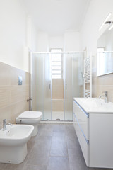 Fototapeta na wymiar Modern bathroom interior in renovated apartment