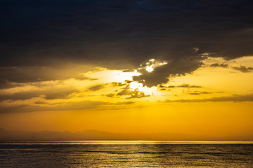 Sunset on the horizon of the sea.