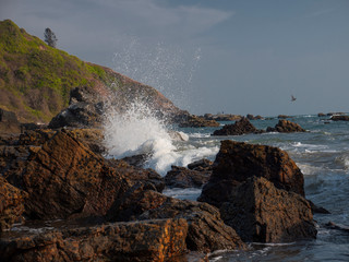 waves beat against the rocks in the Indian Ocean