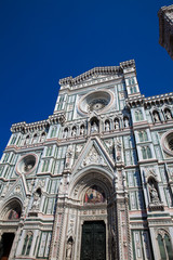 Fototapeta premium The Giotto Campanile and Florence Cathedral consecrated in 1436 against a beautiful blue sky