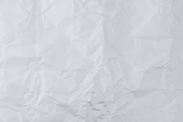 white crumpled paper texture background.