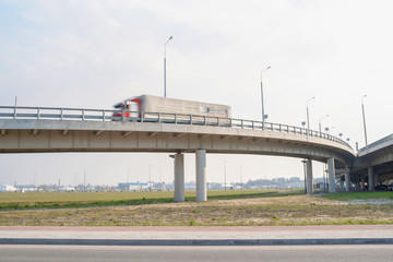 blurred truck moving over the bridge