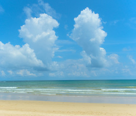 landscape, serenity, azure sea with an empty beach. blue sky with clouds