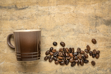 espresso cup and coffee beans abstract
