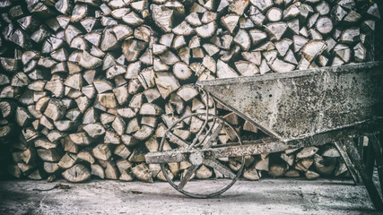 Hand Barrow With Firewood Stock ready for winter farmhouse