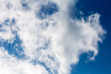 white cloud in blue sky shot on a summer day