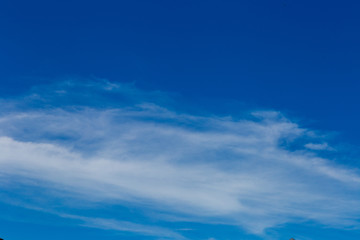 Naklejka na ściany i meble white cloud in blue sky shot on a summer day