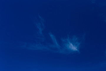 white cloud in blue sky shot on a summer day