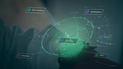 A businessman using a futuristic computer watch and selecting an Analytics concept. - Powered by Adobe